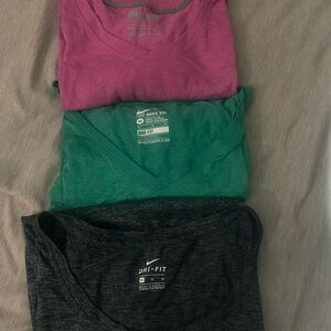 SOLD CROSSPOSTED
Nike Dri-FIT T-Shirts in Pink, Green, and Black Bundle